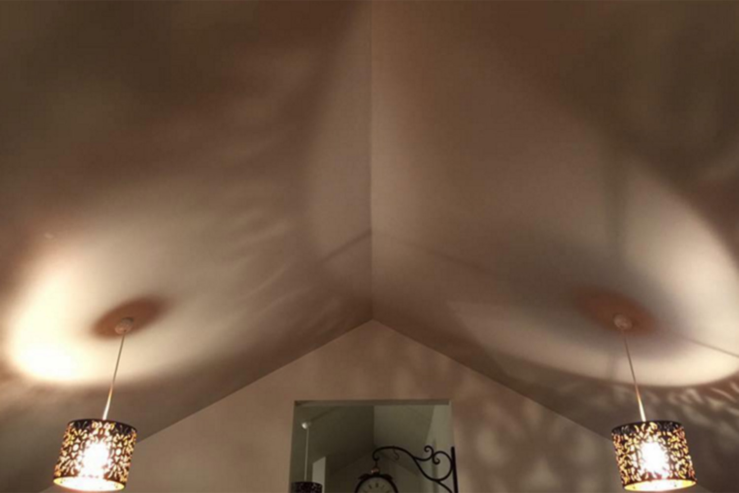 2 ceiling lights that look like boobs